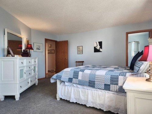 5307 2A St. East, Claresholm, AB - Indoor Photo Showing Bedroom