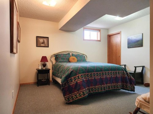5307 2A St. East, Claresholm, AB - Indoor Photo Showing Bedroom