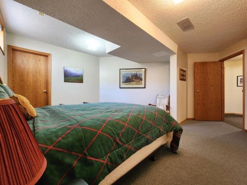 5307 2A St. East, Claresholm, AB - Indoor Photo Showing Bedroom