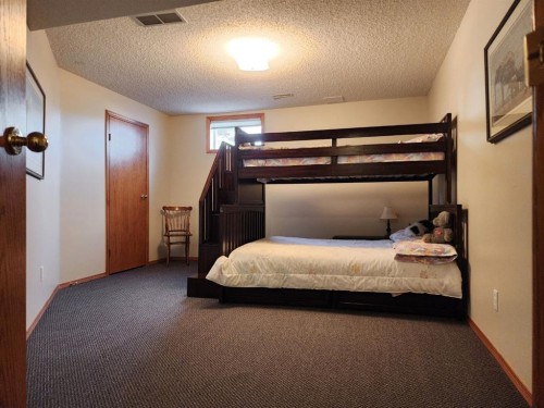 5307 2A St. East, Claresholm, AB - Indoor Photo Showing Bedroom