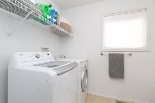 1917 Parkside Point, Coaldale, AB - Indoor Photo Showing Laundry Room