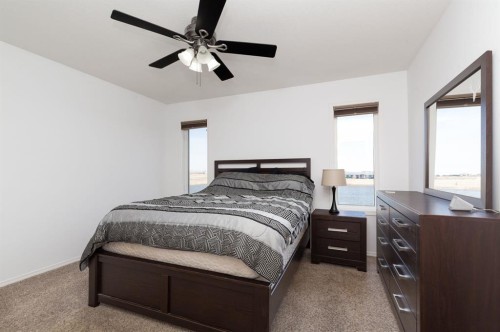 1917 Parkside Point, Coaldale, AB - Indoor Photo Showing Bedroom