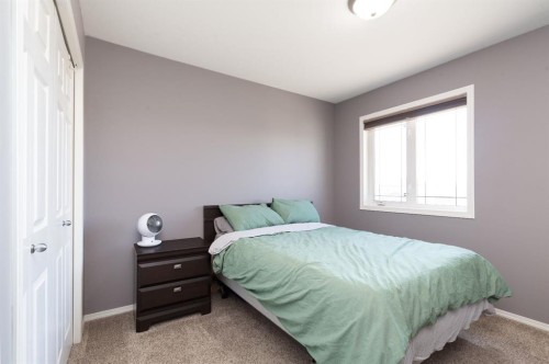 1917 Parkside Point, Coaldale, AB - Indoor Photo Showing Bedroom