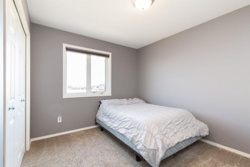 1917 Parkside Point, Coaldale, AB - Indoor Photo Showing Bedroom