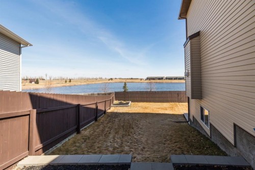 1917 Parkside Point, Coaldale, AB - Outdoor With Body Of Water With Exterior