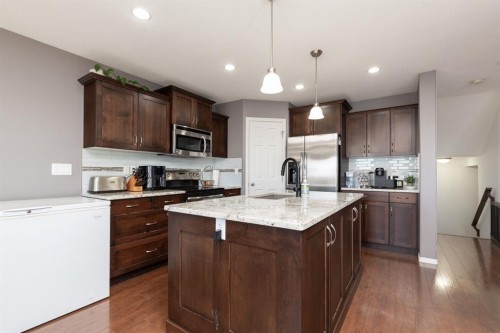 1917 Parkside Point, Coaldale, AB - Indoor Photo Showing Kitchen With Upgraded Kitchen