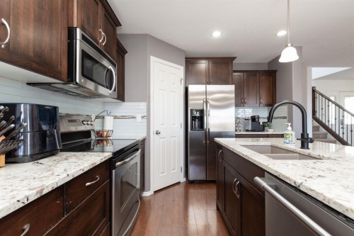 1917 Parkside Point, Coaldale, AB - Indoor Photo Showing Kitchen With Stainless Steel Kitchen With Double Sink With Upgraded Kitchen