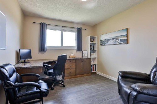 155E 100N, Raymond, AB - Indoor Photo Showing Office