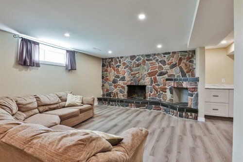 155E 100N, Raymond, AB - Indoor With Fireplace