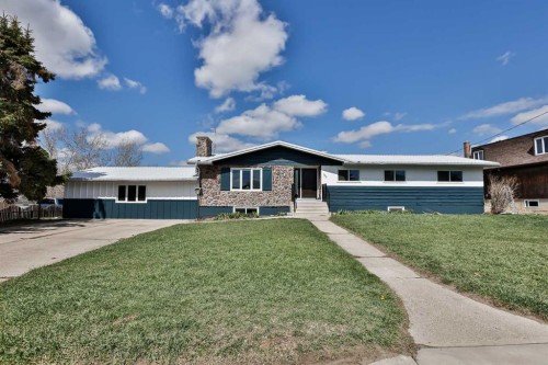 155E 100N, Raymond, AB - Outdoor With Facade