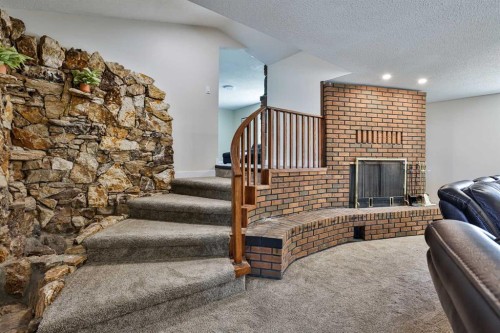 155E 100N, Raymond, AB - Indoor With Fireplace