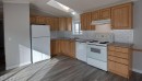 33-6101 20Th Avenue, Coleman, AB  - Indoor Photo Showing Kitchen With Double Sink 