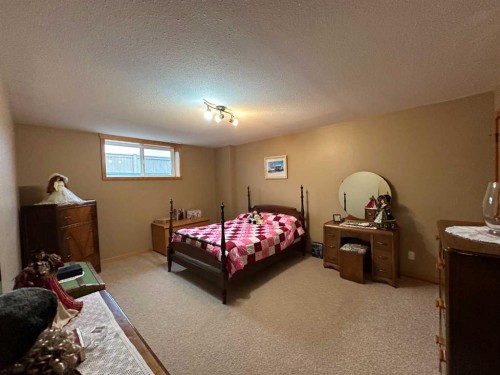 21 Ironstone Drive, Coleman, AB - Indoor Photo Showing Bedroom