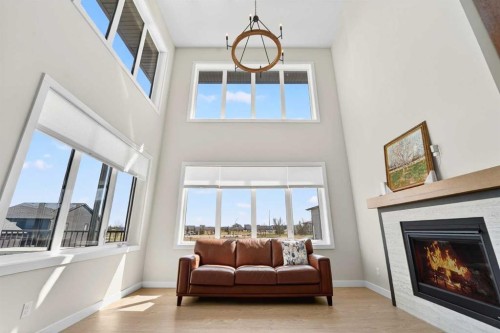 640 Devonia Road West, Lethbridge, AB - Indoor Photo Showing Living Room With Fireplace