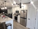 A & B-50 Sage Brush Avenue, Taber, AB  - Indoor Photo Showing Kitchen With Stainless Steel Kitchen 