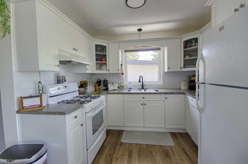 1804 22 Avenue, Coaldale, AB - Indoor Photo Showing Kitchen With Double Sink