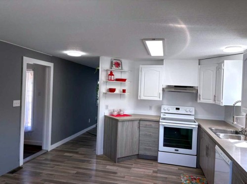 6314 48 Street, Taber, AB - Indoor Photo Showing Kitchen With Double Sink