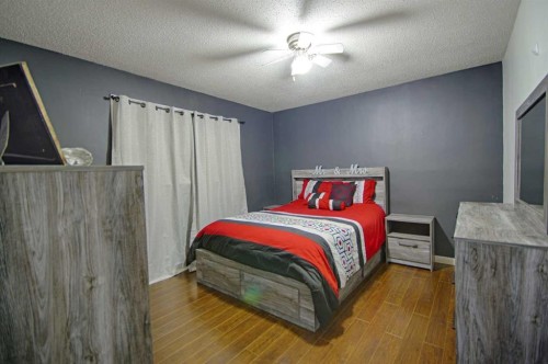4925 53 Avenue, Taber, AB - Indoor Photo Showing Bedroom