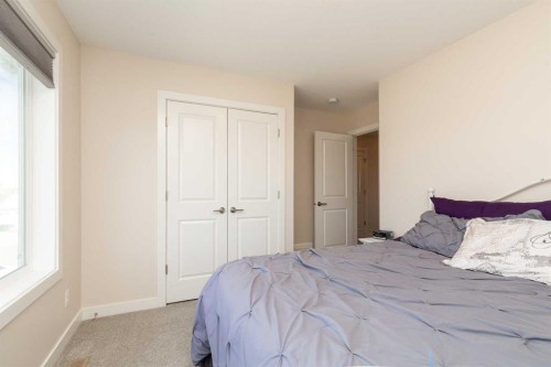 1009 Atlantic Lookout West, Lethbridge, AB - Indoor Photo Showing Bedroom