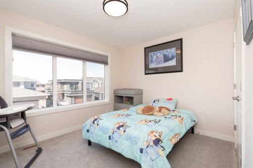 1009 Atlantic Lookout West, Lethbridge, AB - Indoor Photo Showing Bedroom