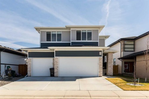 1009 Atlantic Lookout West, Lethbridge, AB - Outdoor With Facade