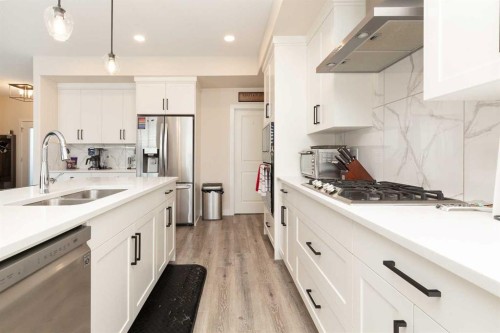 1009 Atlantic Lookout West, Lethbridge, AB - Indoor Photo Showing Kitchen With Double Sink With Upgraded Kitchen