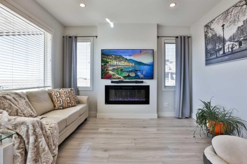 942 Miners Boulevard, Lethbridge, AB - Indoor Photo Showing Living Room With Fireplace