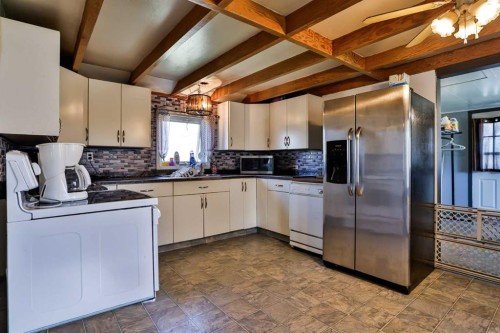 209 3 Avenue, Warner, AB - Indoor Photo Showing Kitchen With Double Sink