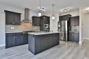 522 Moonlight Lane West, Lethbridge, AB  - Indoor Photo Showing Kitchen With Stainless Steel Kitchen With Upgraded Kitchen 
