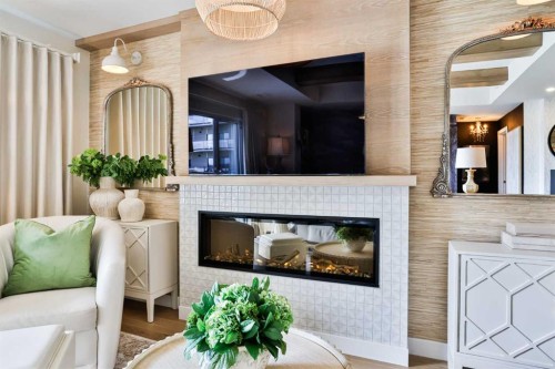 217-102 Scenic Drive North, Lethbridge, AB - Indoor Photo Showing Living Room With Fireplace
