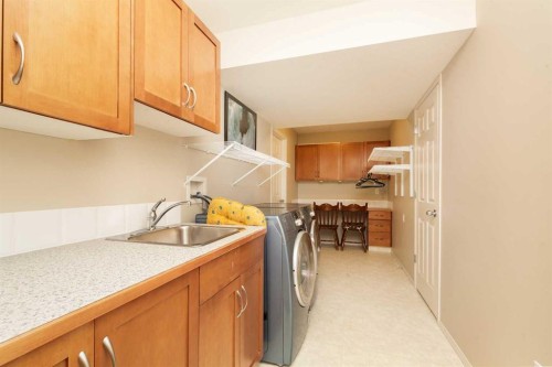 11 Salish Bay West, Lethbridge, AB - Indoor Photo Showing Laundry Room