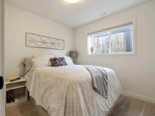 1373 Pacific Circle West, Lethbridge, AB - Indoor Photo Showing Bedroom