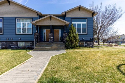 5-16 Sunridge Boulevard West, Lethbridge, AB - Outdoor With Facade