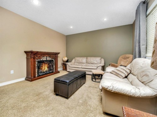 689 Blackfoot Terrace West, Lethbridge, AB - Indoor With Fireplace
