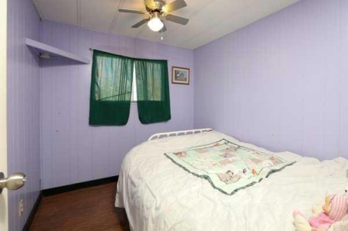 22720, 22718 8 Avenue, Hillcrest, AB - Indoor Photo Showing Bedroom