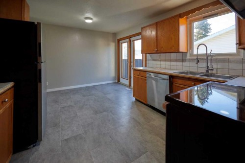 2501 13 Avenue North, Lethbridge, AB - Indoor Photo Showing Kitchen With Double Sink