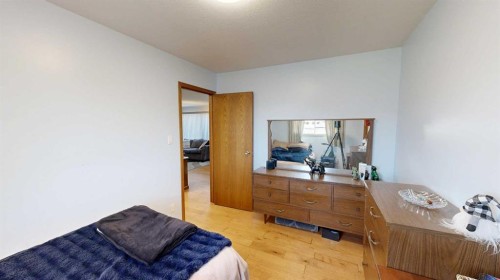 2119 17A Avenue, Coaldale, AB - Indoor Photo Showing Bedroom
