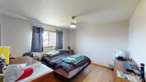 2119 17A Avenue, Coaldale, AB - Indoor Photo Showing Bedroom