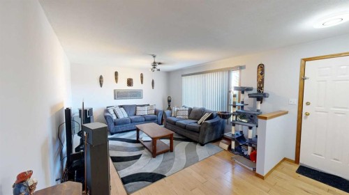 2119 17A Avenue, Coaldale, AB - Indoor Photo Showing Living Room