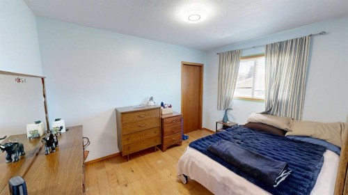 2119 17A Avenue, Coaldale, AB - Indoor Photo Showing Bedroom