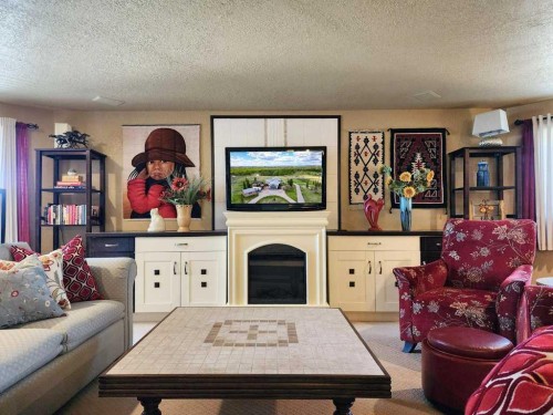 20 Deer Path Meadow, Fort Macleod, AB - Indoor Photo Showing Living Room With Fireplace