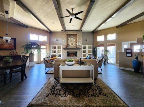 20 Deer Path Meadow, Fort Macleod, AB - Indoor Photo Showing Living Room With Fireplace
