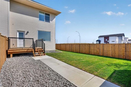 2605 16 Avenue, Coaldale, AB - Outdoor With Deck Patio Veranda