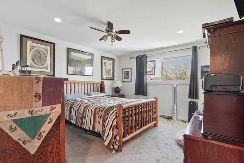 120 S 50 West, Raymond, AB - Indoor Photo Showing Bedroom