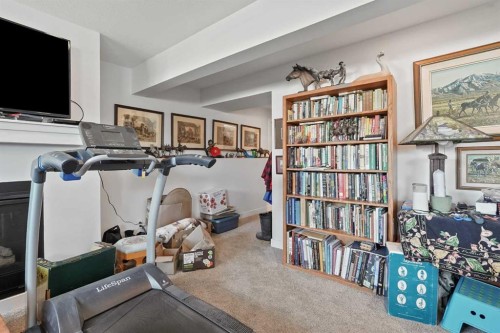120 S 50 West, Raymond, AB - Indoor Photo Showing Gym Room