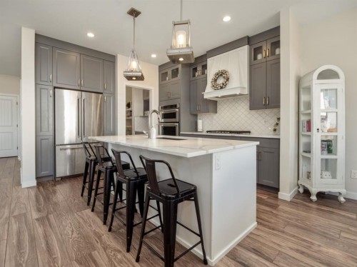 653 Aquitania Boulevard West, Lethbridge, AB - Indoor Photo Showing Kitchen With Upgraded Kitchen