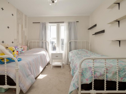 653 Aquitania Boulevard West, Lethbridge, AB - Indoor Photo Showing Bedroom