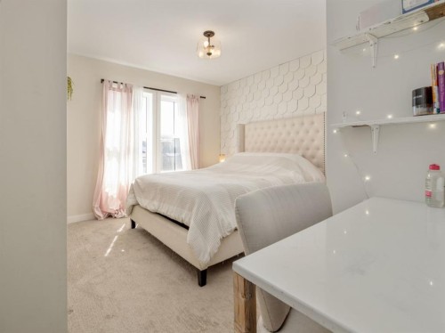 653 Aquitania Boulevard West, Lethbridge, AB - Indoor Photo Showing Bedroom