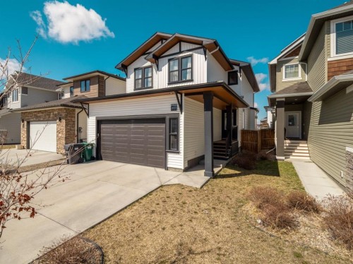 653 Aquitania Boulevard West, Lethbridge, AB - Outdoor With Facade