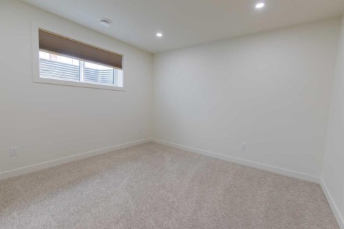 306 Bridge Crossing Close, Raymond, AB - Indoor Photo Showing Other Room